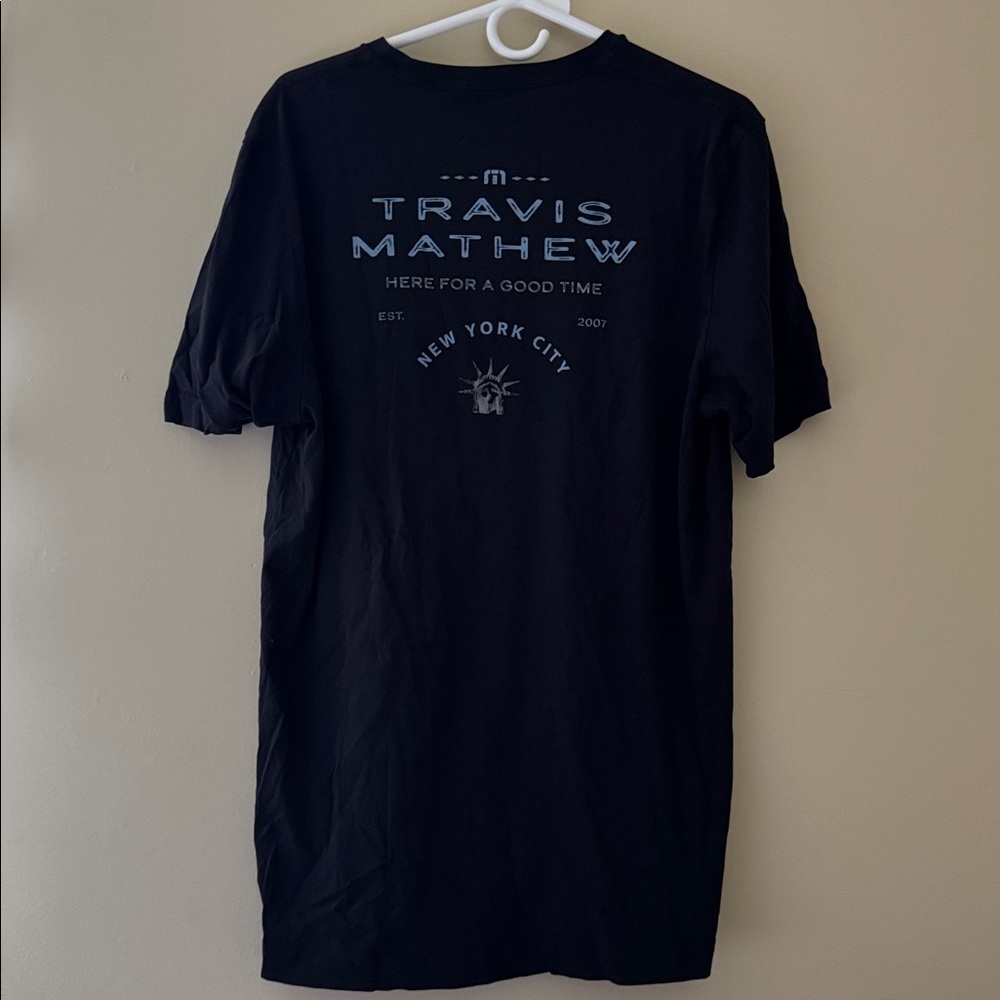 Travis Mathew Black Tee with Blue NYC Graphic